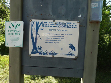 Wildlife refuge rules at north parking lot – leash dogs – bikes on paved trails only